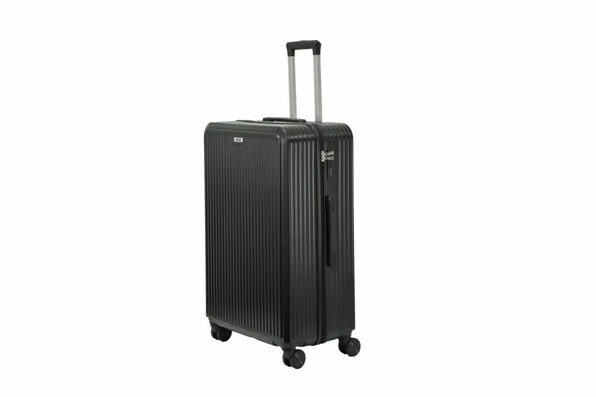 28 inch black hard shell luggage with fine vertical ribs, side view with four wheels