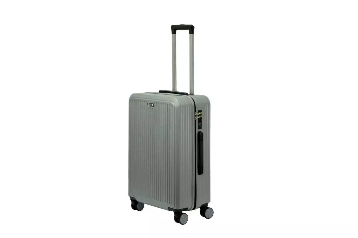 24 inch silver hard shell luggage with fine vertical ribs, side view with four wheels