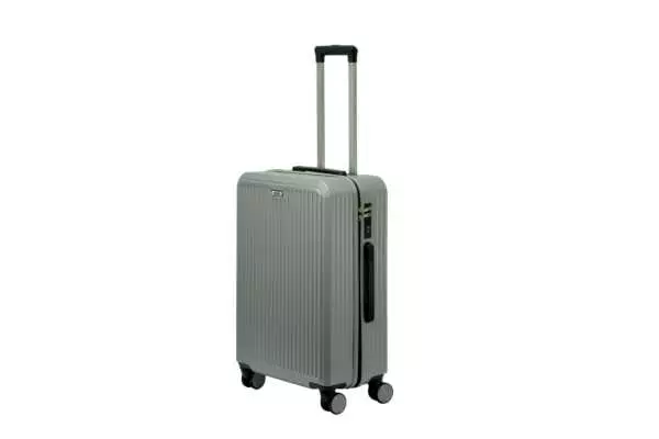 24 inch silver hard shell luggage with fine vertical ribs, side view with four wheels