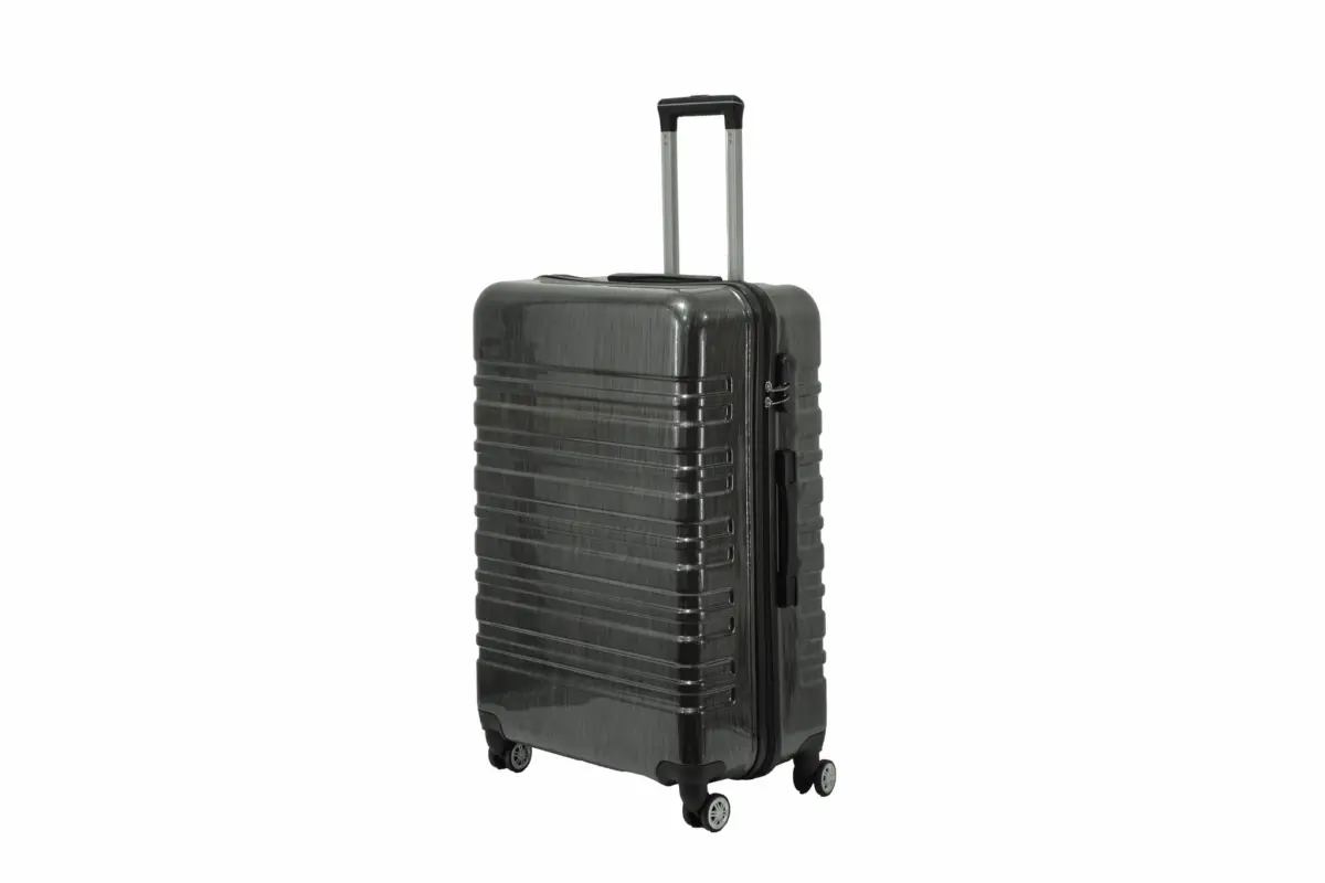 28 inch black hard shell luggage with a brushed finish and horizontal grooves, side view with four wheels