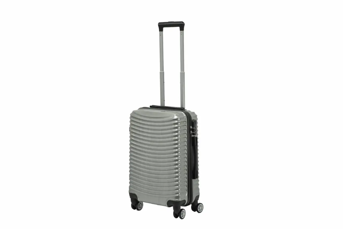 20 inch silver hard shell luggage with curved ribs, side view with four wheels