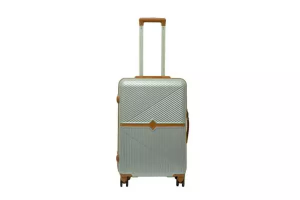24 inch silver hard shell luggage with a tan accent band and top handle, front view