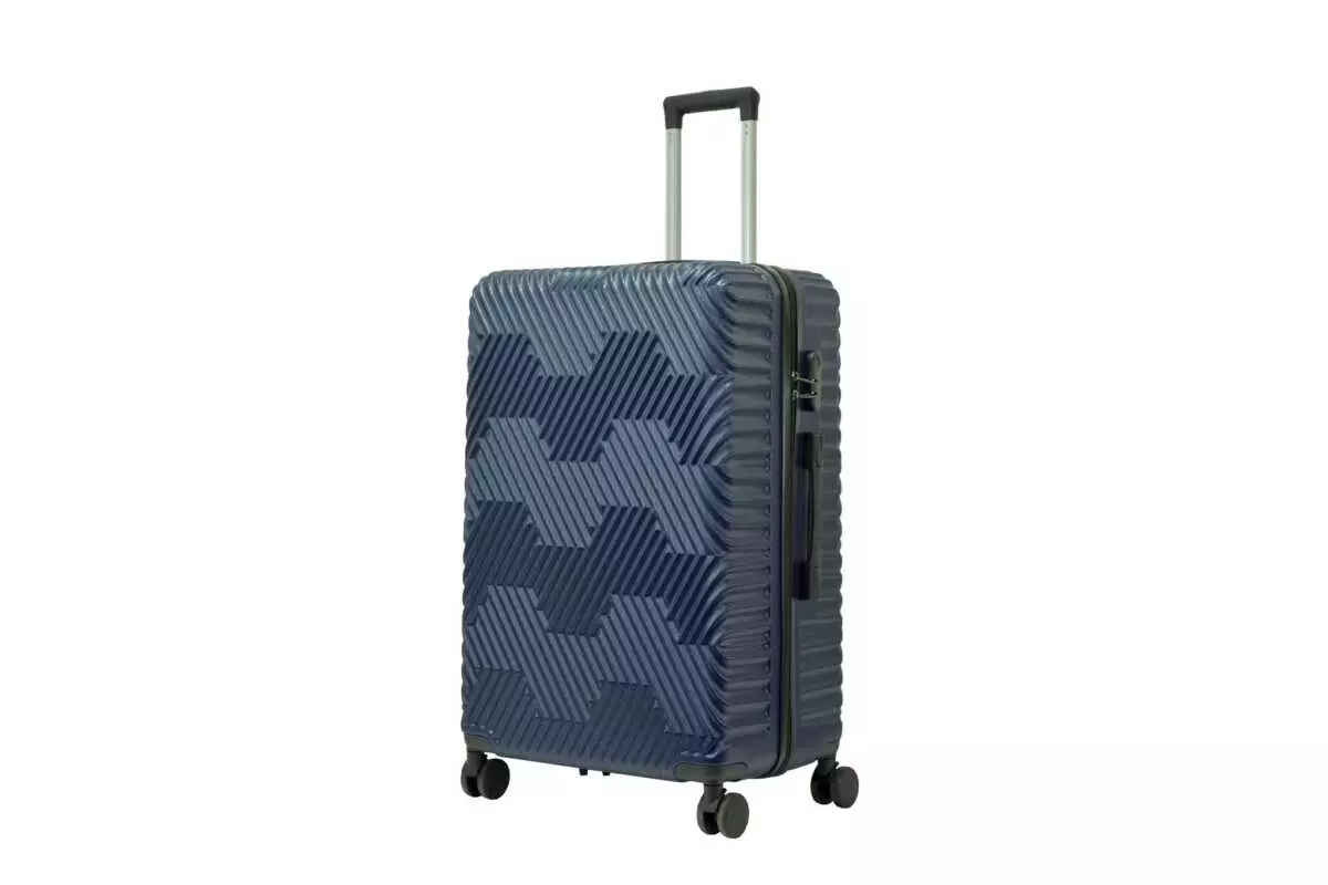 28 inch dark blue hard shell luggage with a geometric zigzag pattern, side view with four wheels