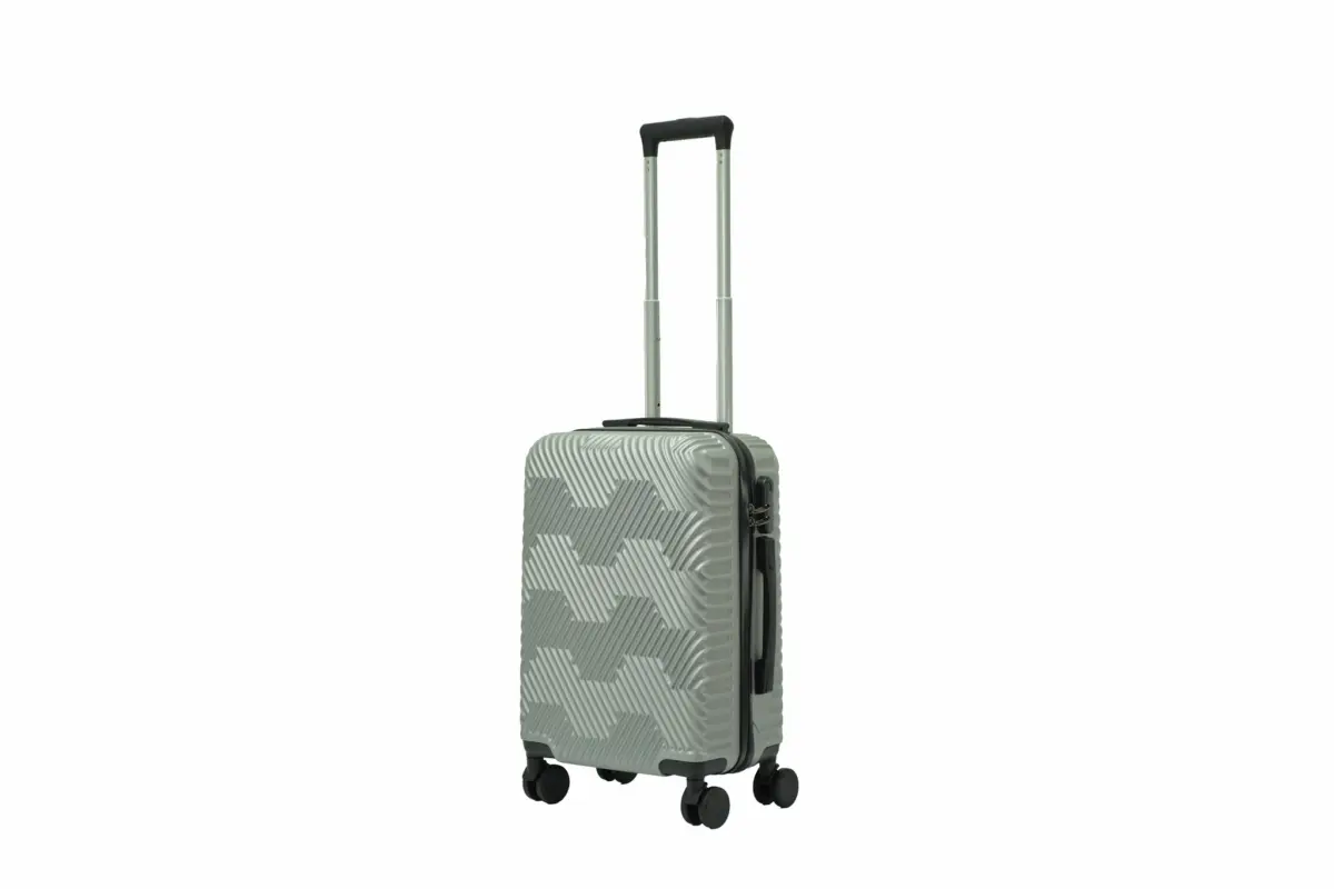 20 inch silver hard shell luggage with a geometric zigzag pattern, side view with four wheels