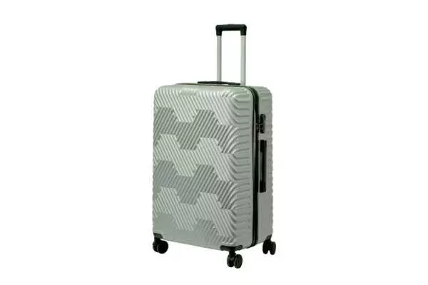 28 inch silver hard shell luggage with a geometric zigzag pattern, side view with four wheels