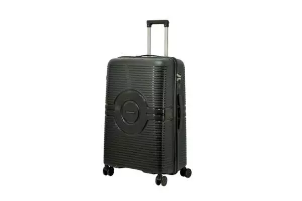 28 inch black hard shell luggage with a round emblem panel, side view with four wheels