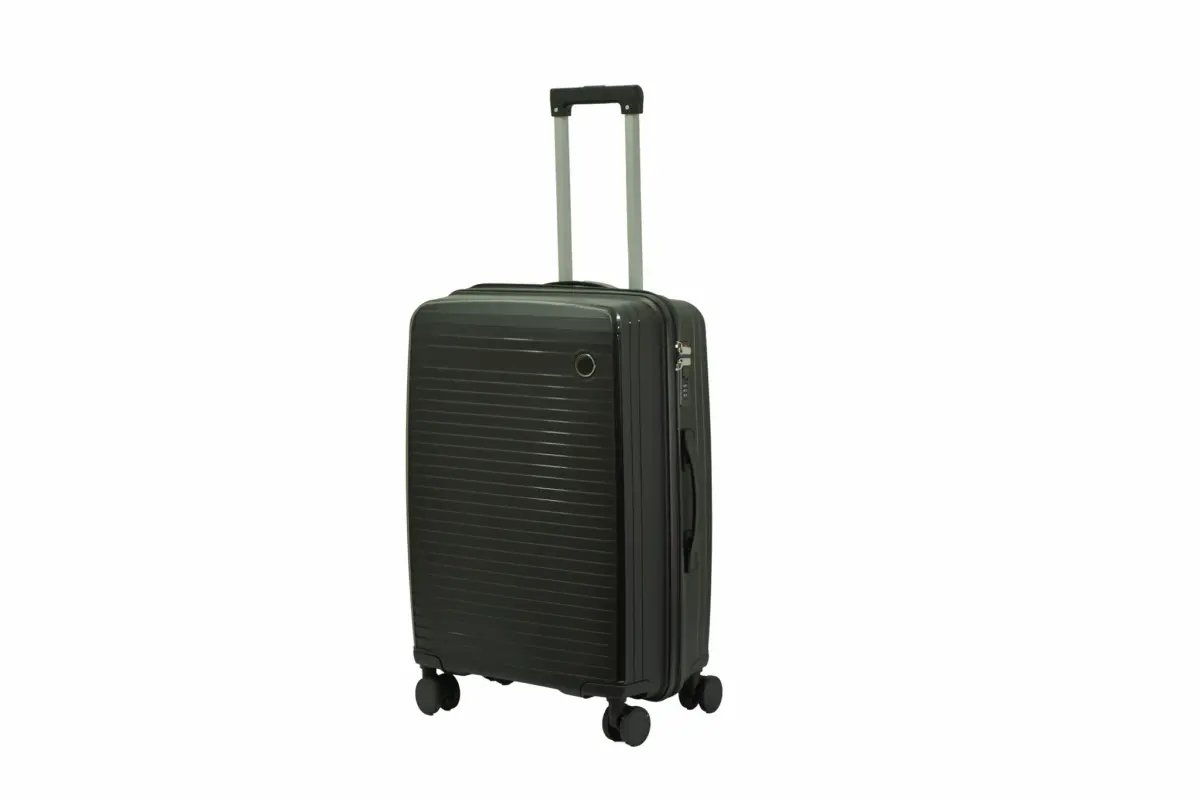 24 inch black hard shell luggage with fine horizontal ribs and a small round badge, side view with four wheels