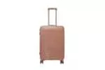 24 inch rose gold hard shell luggage with fine horizontal ribs and a small round badge, front view
