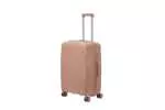 24 inch rose gold hard shell luggage with fine horizontal ribs and a small round badge, side view with four wheels
