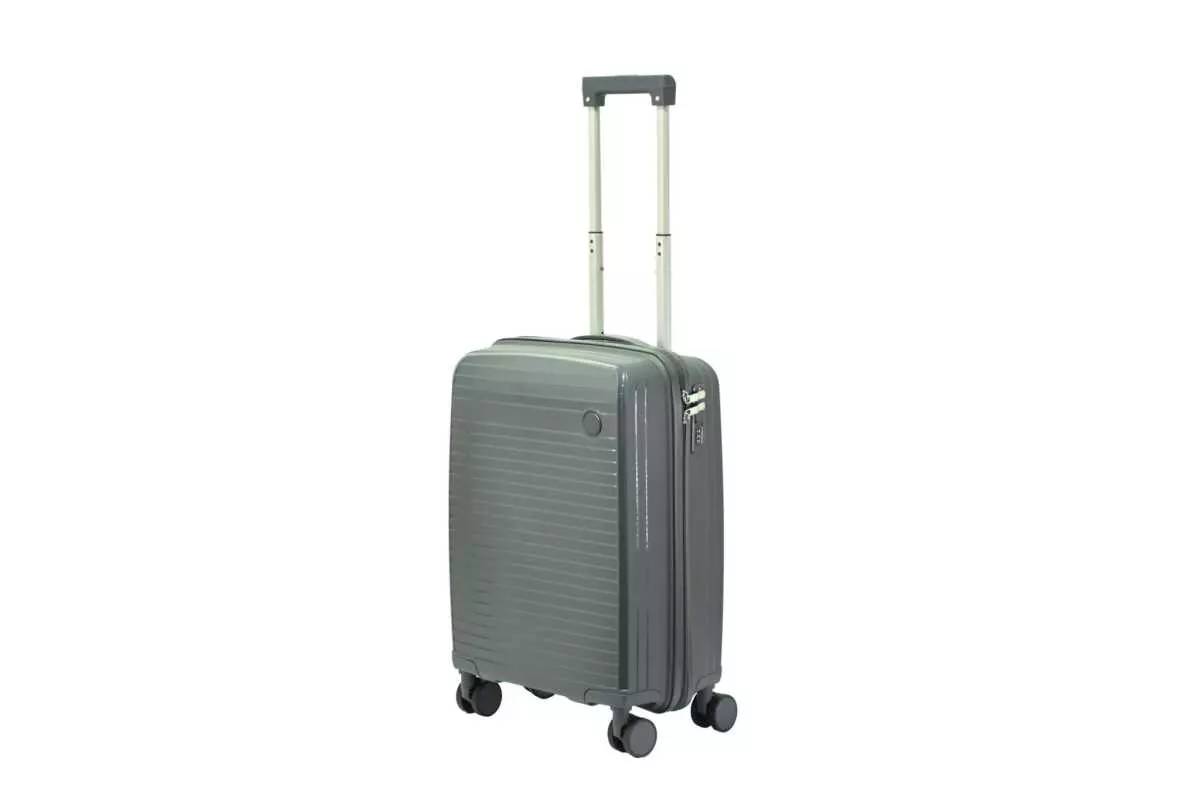 20 inch dark grey hard shell luggage with fine horizontal ribs and a small round badge, side view with four wheels