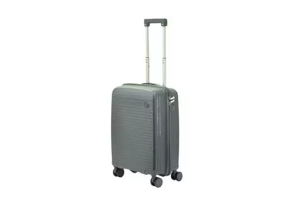 20 inch dark grey hard shell luggage with fine horizontal ribs and a small round badge, side view with four wheels